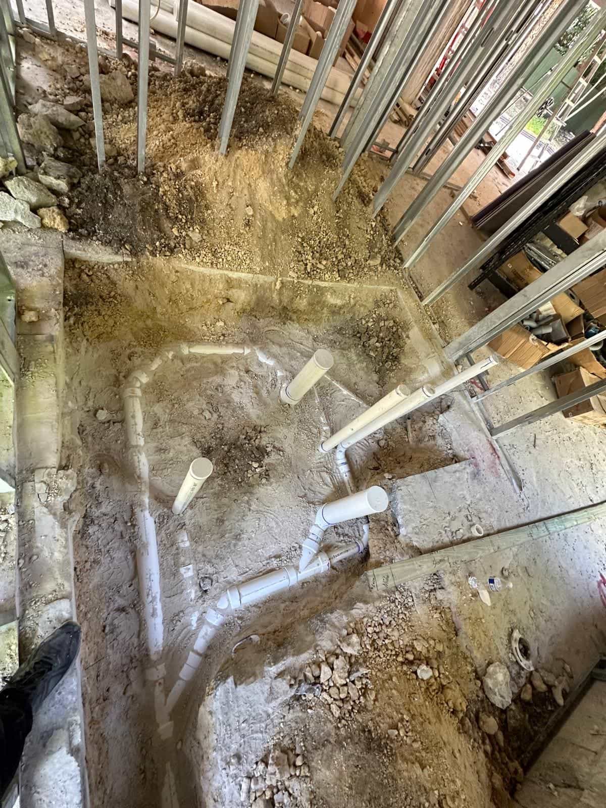 Before and after of a Underground pipe assemply by a plumber in Key Biscayne