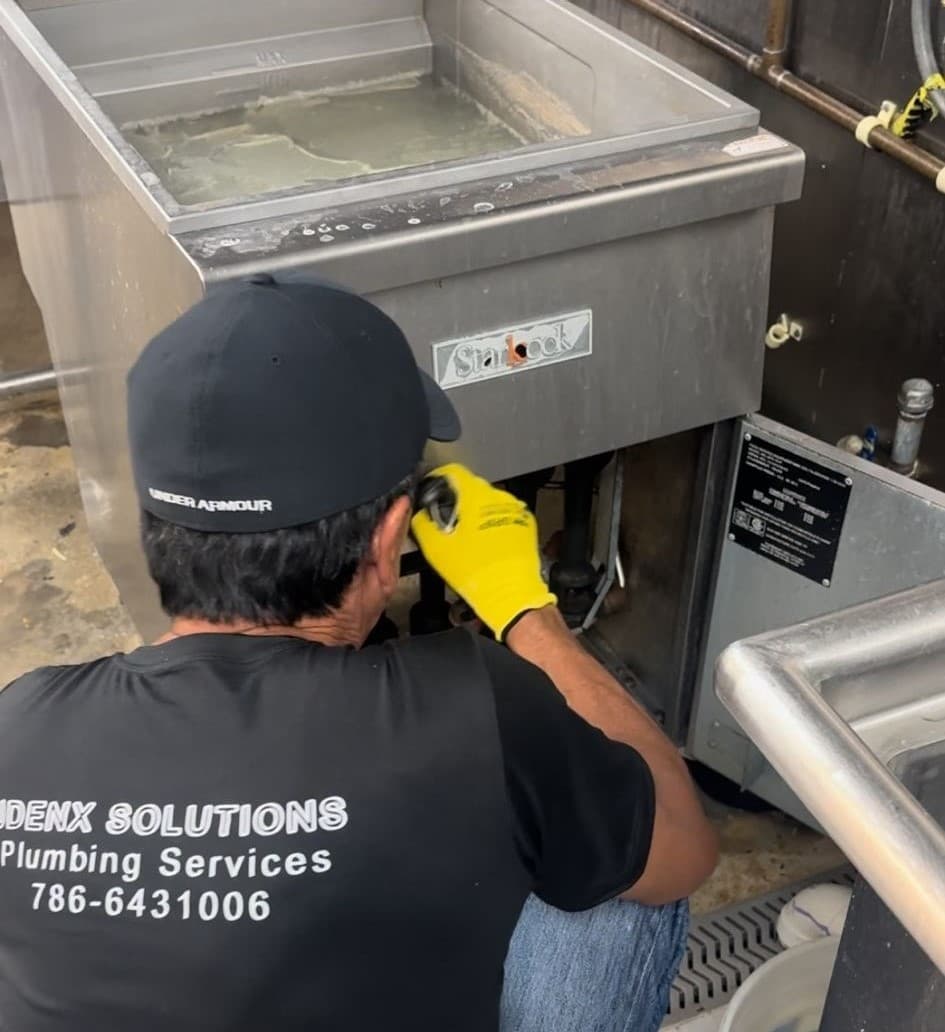 Plumber in Key Biscayne working on a project